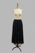 Jupe midi noire à empiècements, taille 44