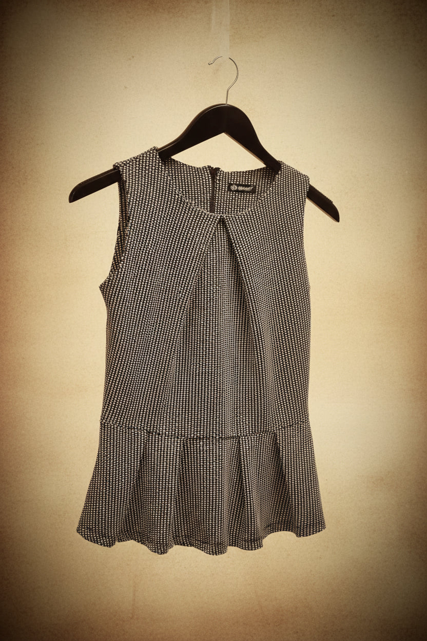 Blusa sin mangas peplum