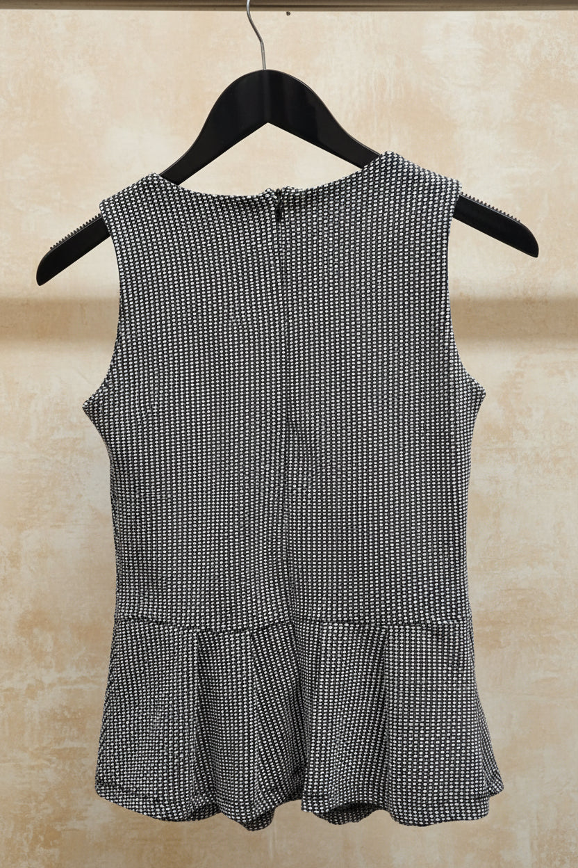 Blusa sin mangas peplum