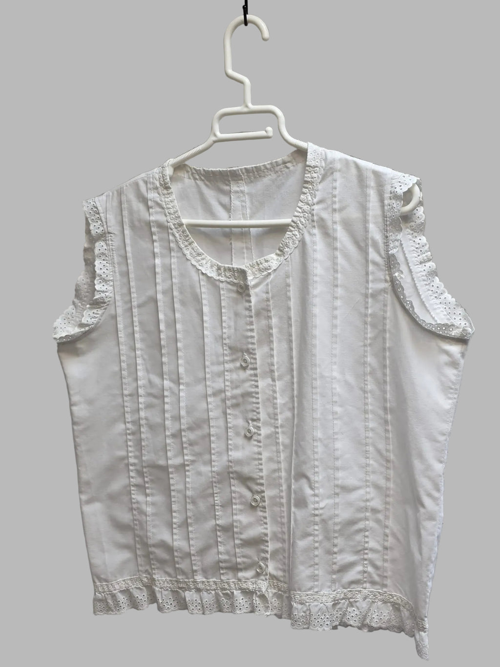 Blusa blanca sin mangas
