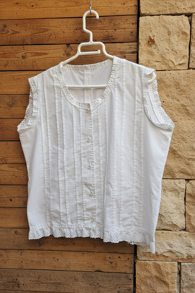 Blusa blanca sin mangas